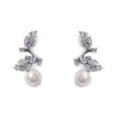 Photograph: Ivory and Co Aphrodite Crystal Leaves and Pearl Wedding Earrings