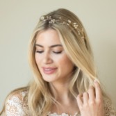 Photograph: Ivory and Co Aurora Gold Dainty Pearl and Crystal Hair Vine