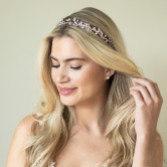 Photograph: Ivory and Co Moonshine Rose Gold Pearl and Crystal Headband