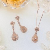 Photograph: Ivory and Co Moonstruck Rose Gold Crystal Bridal Jewelry Set