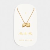 Photograph: Katie Loxton collier de breloques de mariage en or 