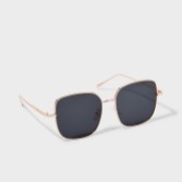 Photograph: Katie Loxton Lunettes de soleil carrées Sahara or et noir