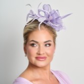 Photograph: Lilac Sinamay and Feather Wedding Fascinator