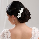 Photograph: Nieve Ivory Porcelain Flowers and Pearl Wedding Hair Comb
