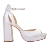 Photograph: Perfect Bridal Camden Dyeable Ivory Satin Block Heel Platform Sandals with Oversized Bow