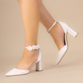 Photograph: Perfect Bridal Detachable Ivory Leather Flower Ankle Straps