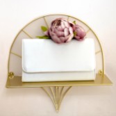 Photograph: Perfect Bridal Evie Dyeable Ivory Satin Clutch Bag