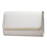 Photograph: Perfect Bridal Pochette Celeste en satin ivoire ornée de perles