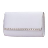 Photograph: Perfect Bridal Pochette Dee en satin argenté et diamants