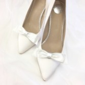 Photograph: Perfect Bridal Rowan Dyeable Ivory Satin Bow Shoe Clips