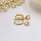 Photograph: Tobago Gold Crystal Embellished Huggie Hoop Earrings