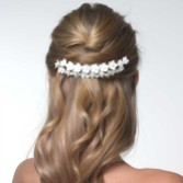 Photograph: Violet Ivory Porcelain Flower Bridal Hair Comb