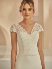 Photograph: Bianco Ivory Floral Lace Bridal Bolero with Cap Sleeves E364