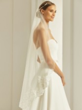 Photograph: Bianco Ivory Single Tier Fingertip Veil with Beaded Lace Edge S286