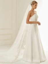 Photograph: Bianco Single Tier Cut Edge Cathedral Veil with Beaded Lace Train S236