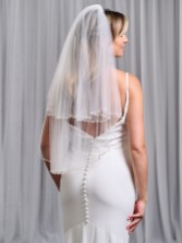 Photograph: Charleston Ivory Two Tier Bead, Diamante and Pearl Edge Elbow Length Veil