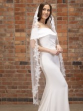 Photograph: Perfect Bridal Ivory Single Tier Pearl Waltz Length Veil with Floral Lace Edge