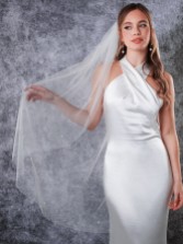 Photograph: Rainbow Club Leilani Ivory Single Tier Scattered Pearl Fingertip Veil