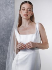 Photograph: Rainbow Club Snapdragon Ivory Single Tier Satin Edge Chapel Veil (voile de chapelle)