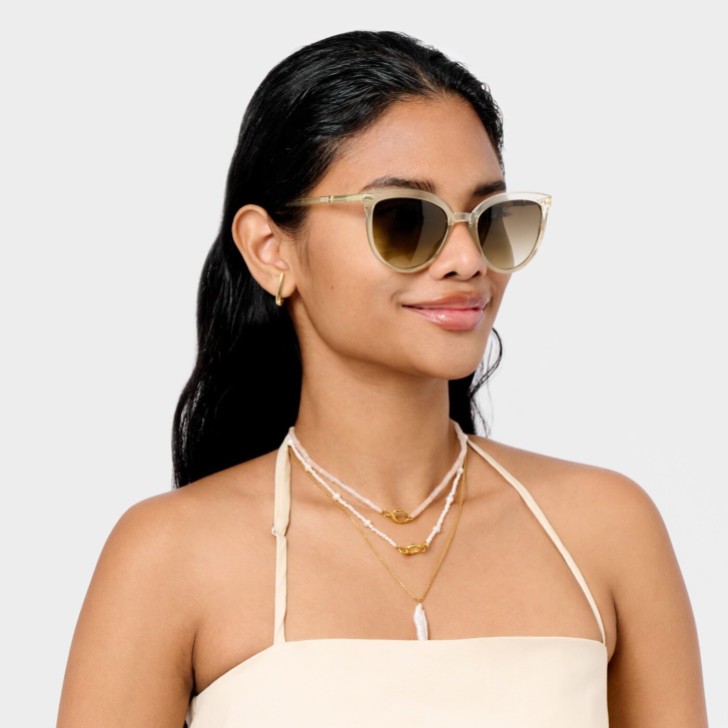 Katie Loxton Lunettes de soleil Ravello Nude Transparent