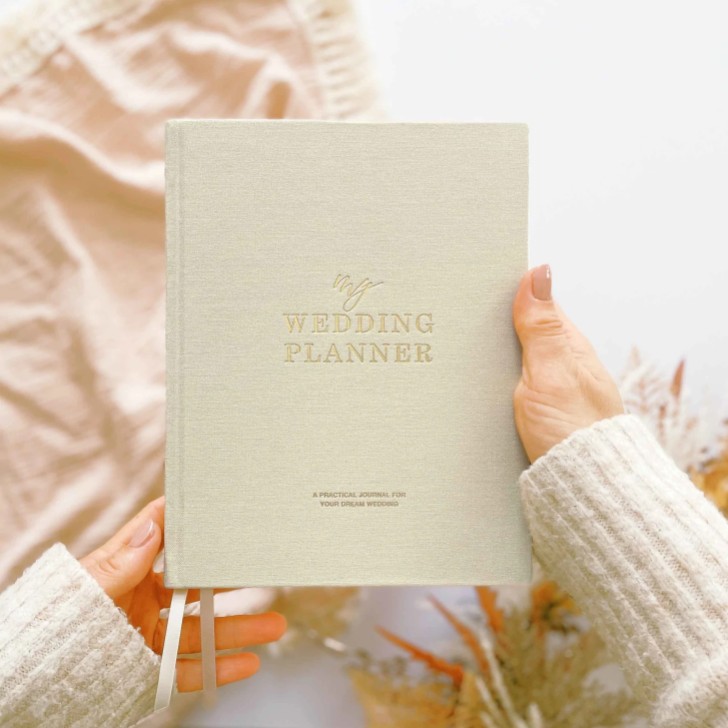 Libro planner per matrimoni in lino di cotone avorio con bordi dorati