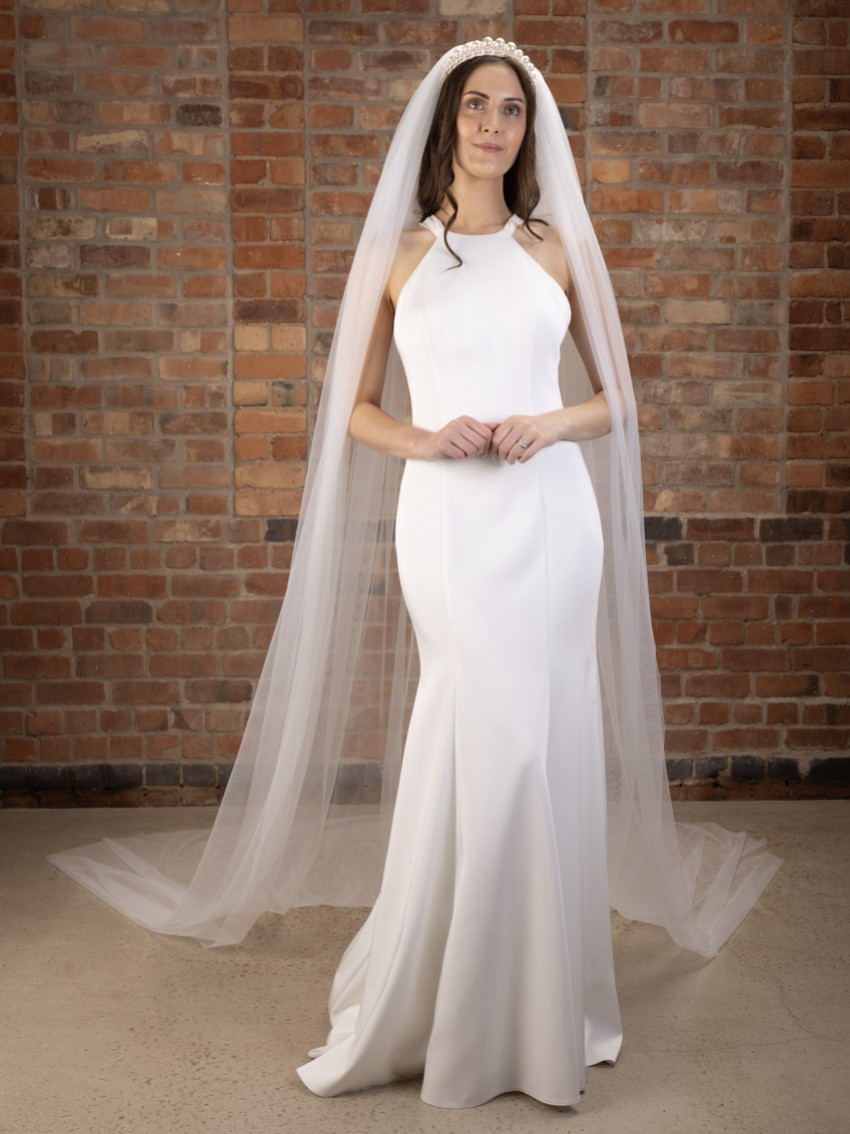 Photograph: Perfect Bridal Ivory Single Tier Plain Cathedral Veil with Cut Edge