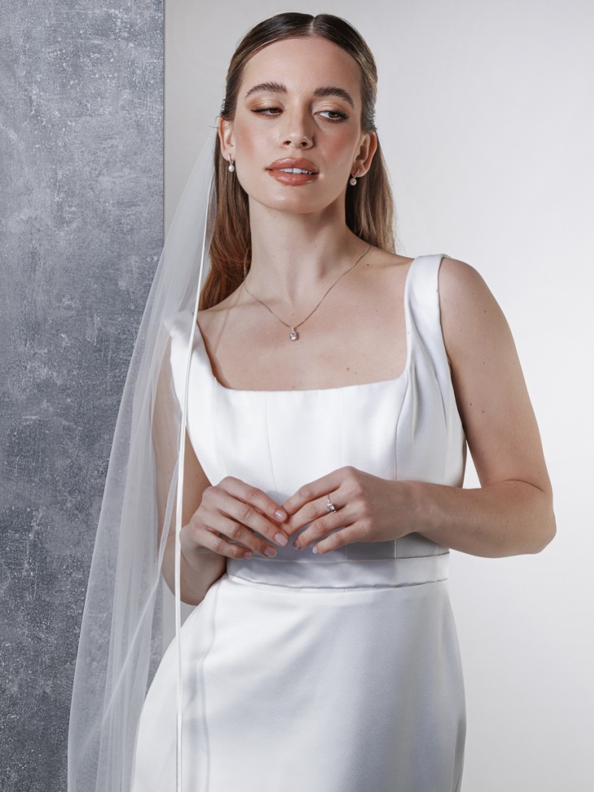 Photograph: Rainbow Club Snapdragon Ivory Single Tier Satin Edge Chapel Veil (voile de chapelle)