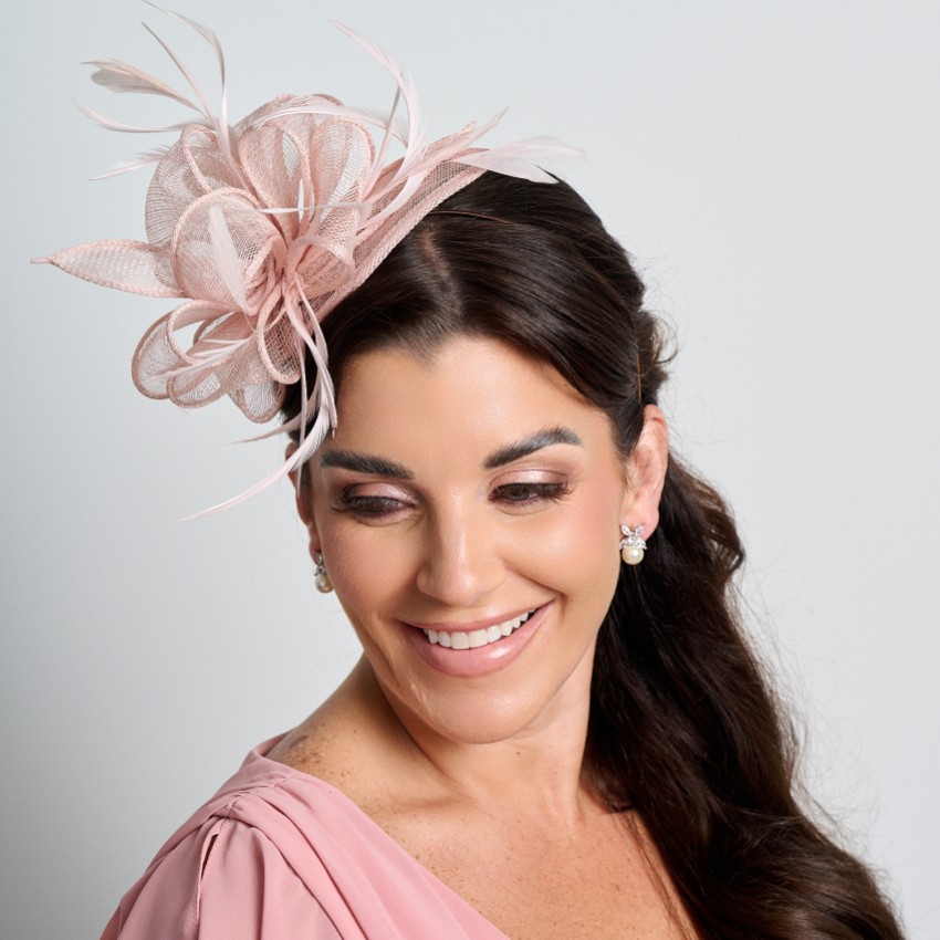 Photograph: Blush Pink Sinamay and Feather Wedding Fascinator