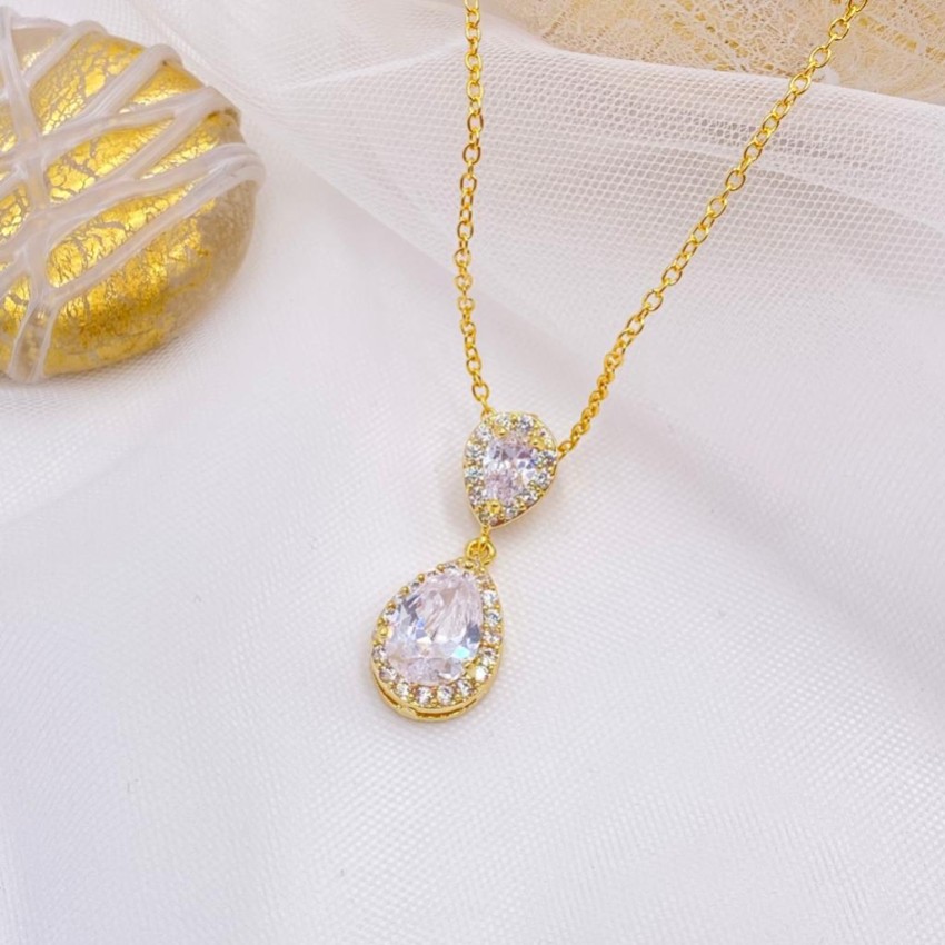 Photograph: Celeste Crystal Embellished Pendant Necklace (Gold)