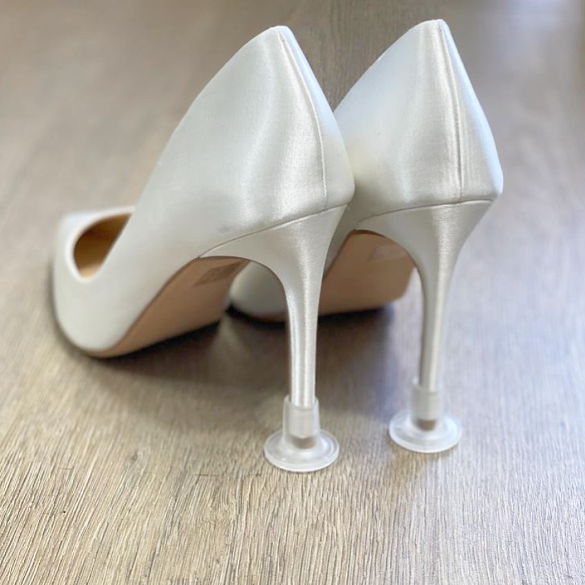 Photograph: Clean Heels Bouchons de talon transparents unis (petits)