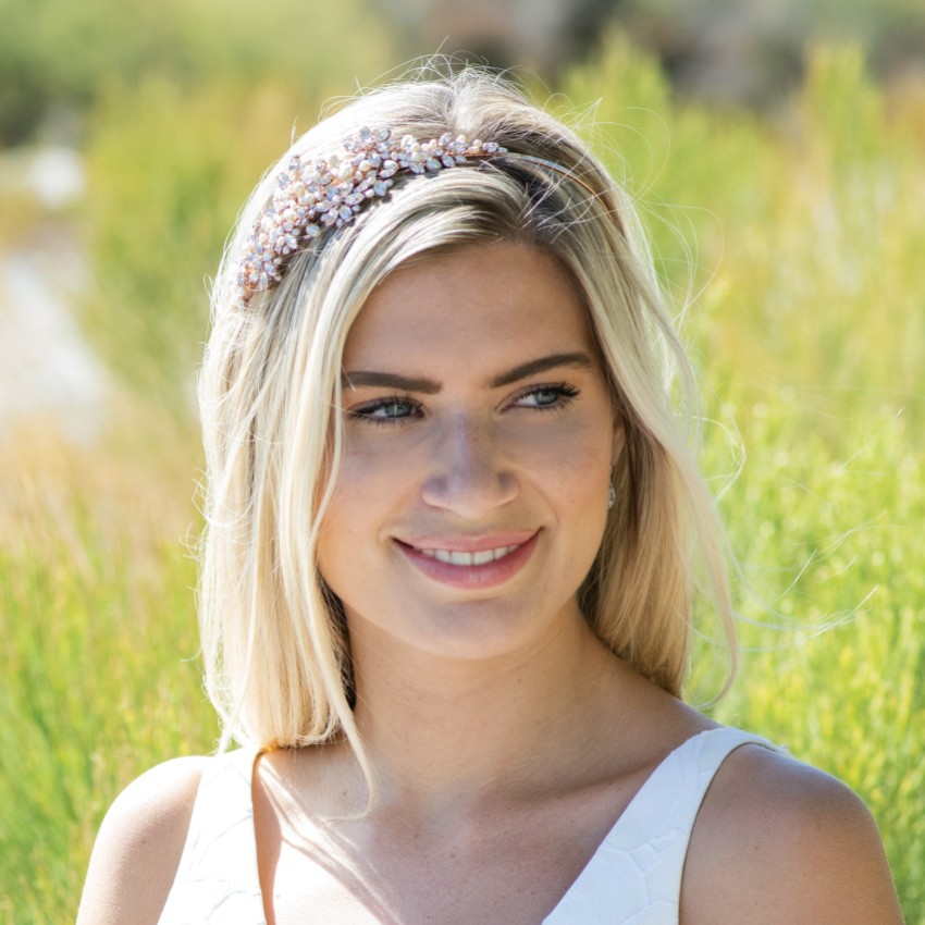 Photograph: Ivory and Co Bandeau Charade en or rose avec fleurs en cristal et perles