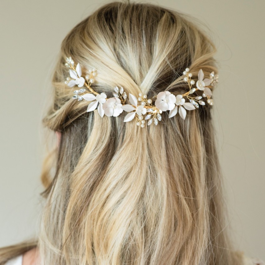 Photograph: Ivory and Co Gold Bloom Crystal and Pearl Floral Crescent Hair Clip