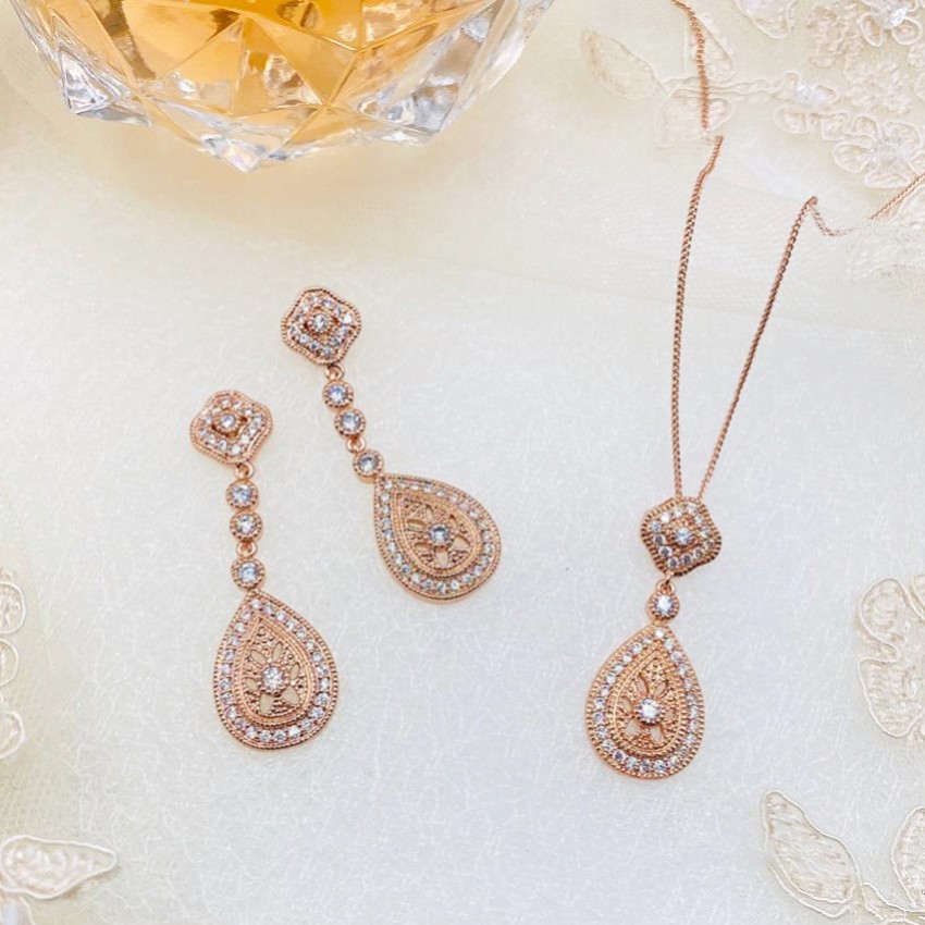 Photograph: Ivory and Co Moonstruck Rose Gold Crystal Bridal Jewellery Set