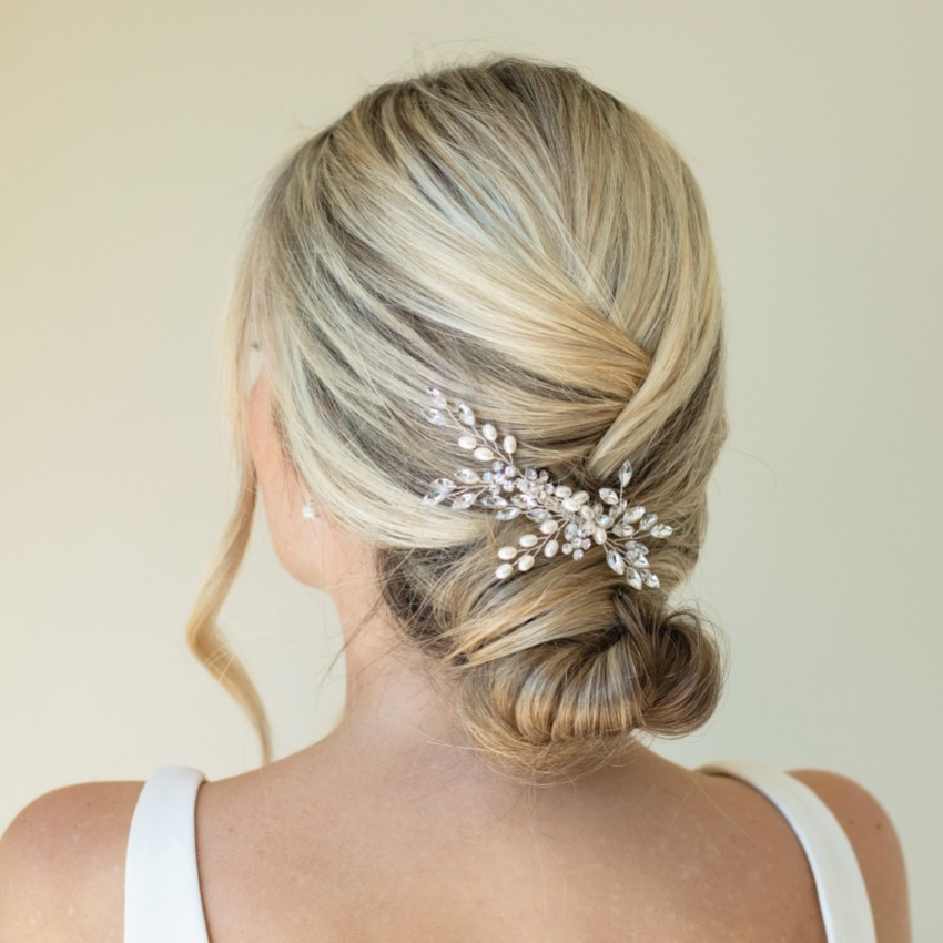 Photograph: Ivory and Co Silver Shimmer Dainty Crystal and Pearl Hair Comb