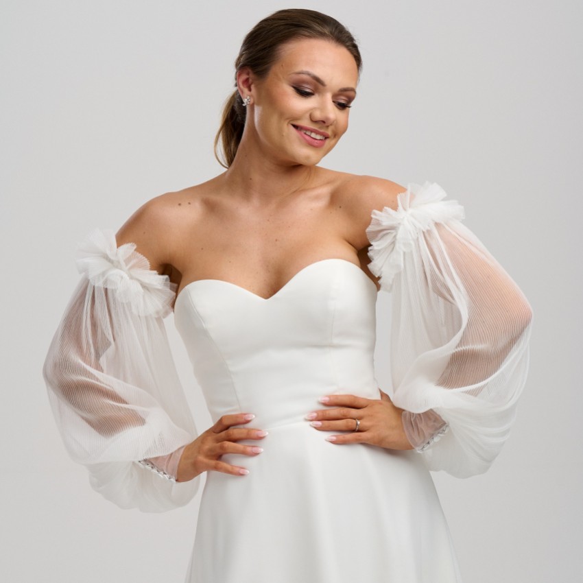 Photograph: Ivory Plisse Tulle Puff Sleeves