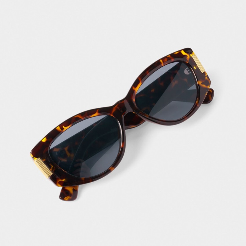 Photograph: Katie Loxton Rimini Tortoiseshell Oval Sunglasses