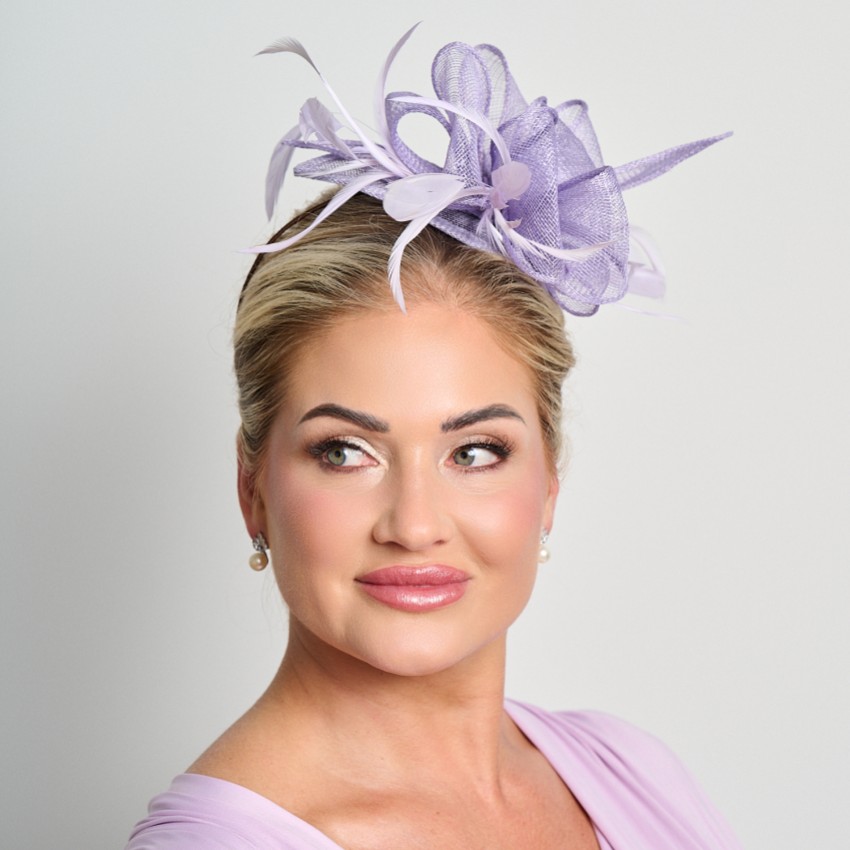 Photograph: Lilac Sinamay and Feather Wedding Fascinator