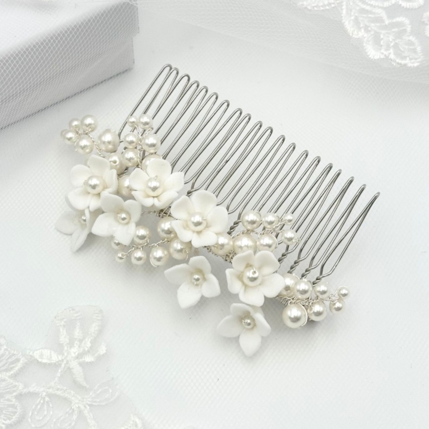 Photograph: Mirabelle Ivory Ceramic Flower and Pearl Wedding Hair Comb