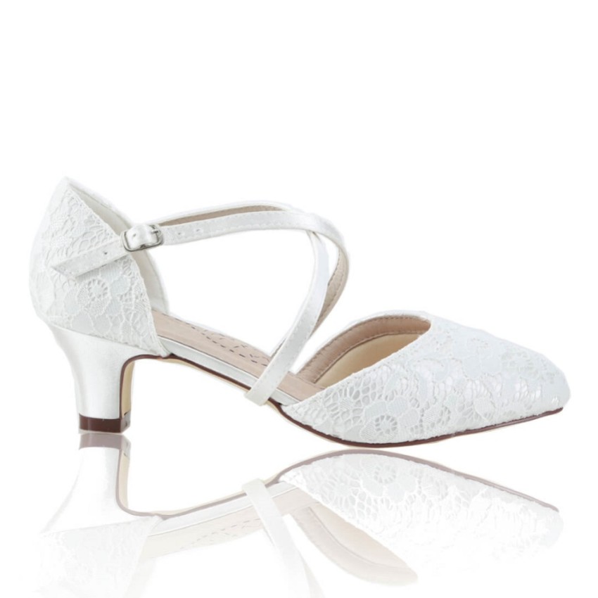 Photograph: Perfect Bridal Renate Dyeable Ivory Lace Low Heel Courts with Crossover Straps