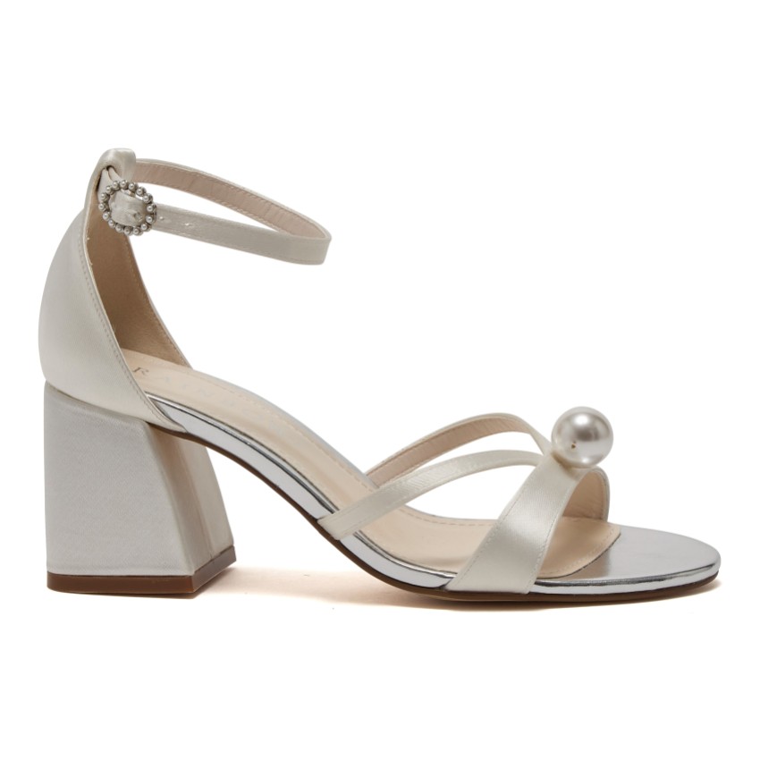 Photograph: Rainbow Club Eliza Dyeable Ivory Satin Pearl Detail Block Heel Sandals