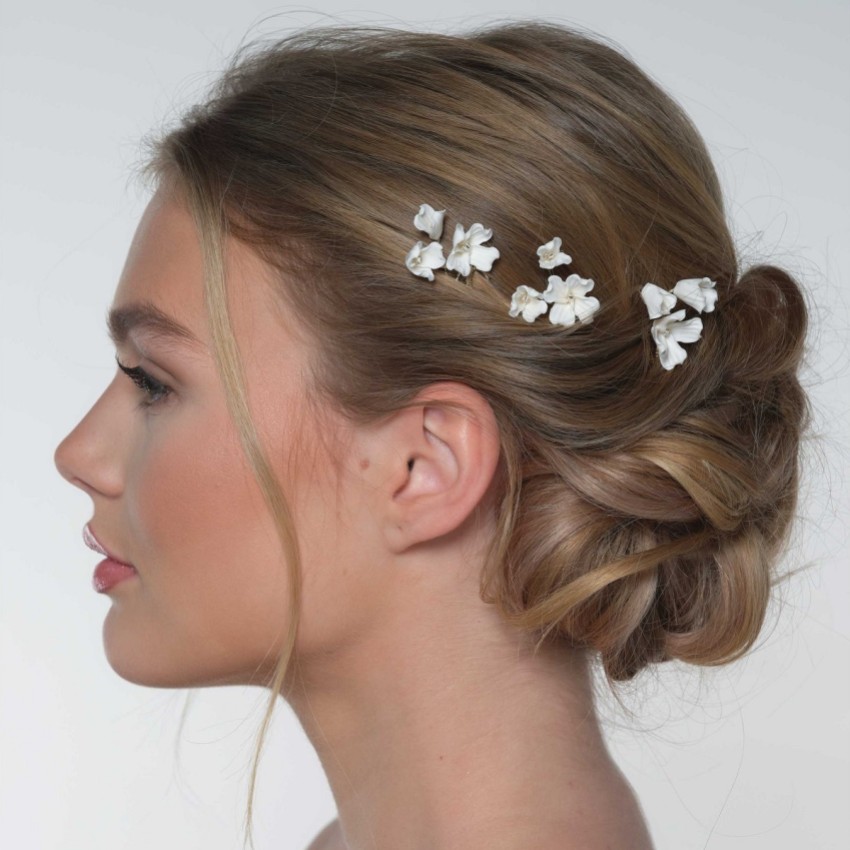 Photograph: Set de 3 épingles à cheveux Camellia en porcelaine ivoire avec fleurs dorées